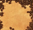Coffee beans making a frame on a brown paper