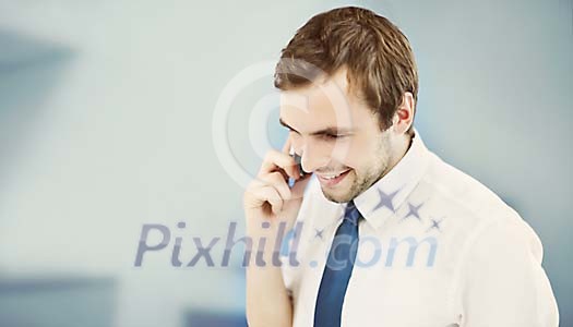 Businessman speaking on cell phone