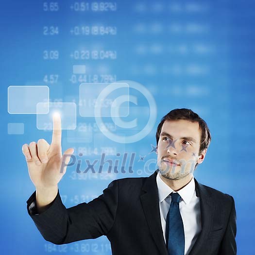 Businessman touching a virtual touchscreen