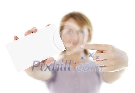 Unfocused female holding an empty business card in her hands Unfocused female holding an empty business card in her hands