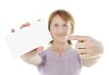 Unfocused female holding an empty business card in her hands
