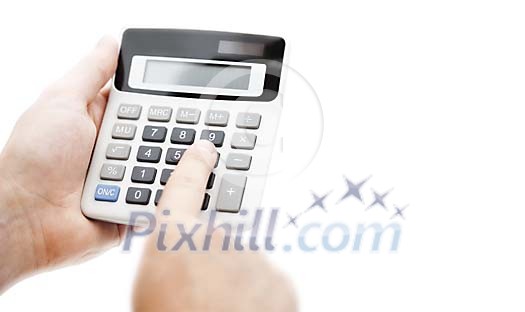 Hand holding a pocket calculator