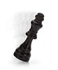 Black chess king falling