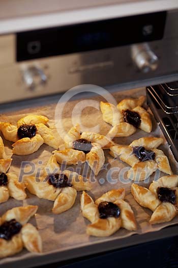 Christmas buns baking in the oven