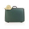 Clipped green suitcase with a straw hat