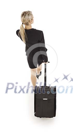 Clipped businesswoman walking away from the camera