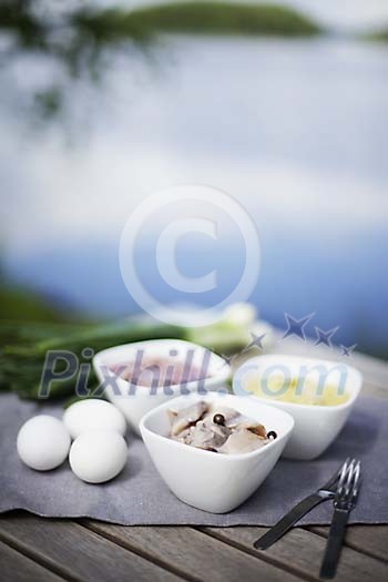 Food on the table by the lake Food on the table by the lake
