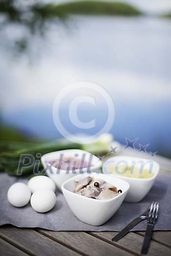 Food on the table by the lake