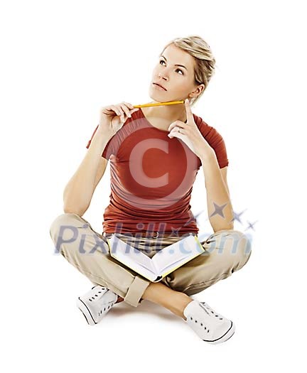 Clipped woman sitting on the floor with a book