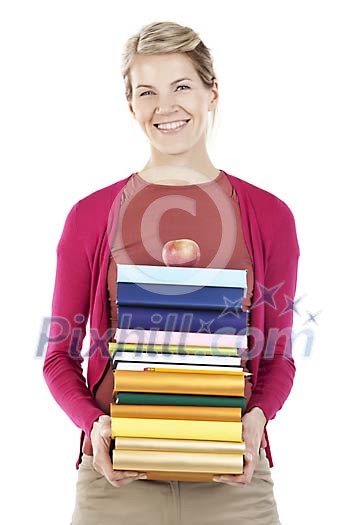 Clipped woman standing with a stack of books and an apple