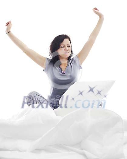 Woman sitting on the bed, waking up Woman sitting on the bed, waking up