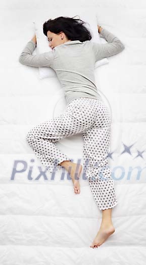 Woman sleeping on the bed Woman sleeping on the bed