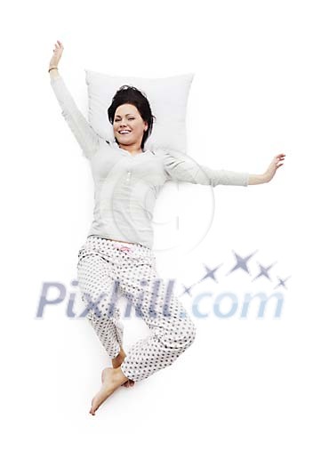 Woman laying on the bed, stretching Woman laying on the bed, stretching