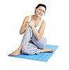 Isolated woman sitting on a yoga mat