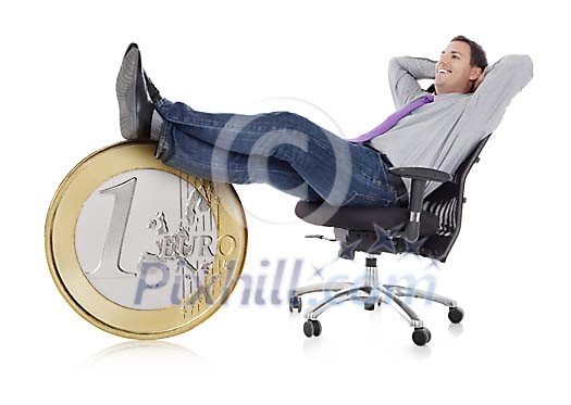 Businessman sitting and resting his feet on a oversized euro coin