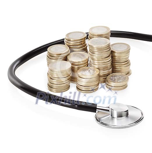 Isolated coins with a stetoscope