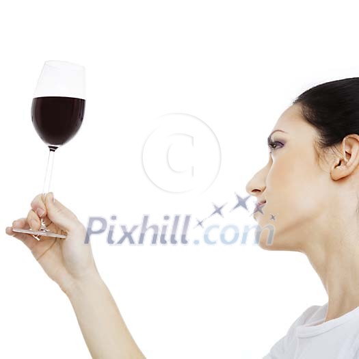 Woman holding a wine glass up