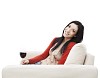 Woman drinking wine on the couch