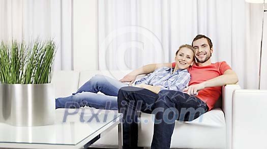 Couple resting on the sofa
