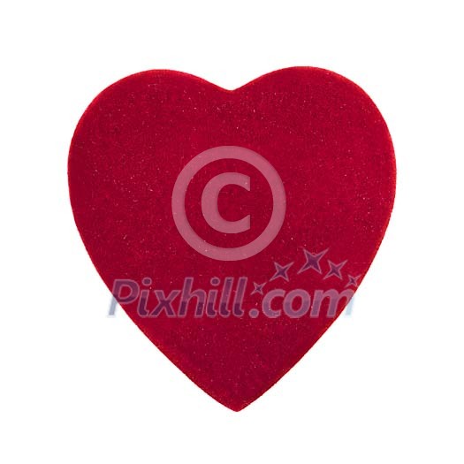 Red heart mad of fabric on a white background