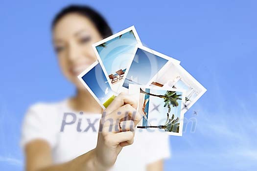 Woman showing vacation photographs
