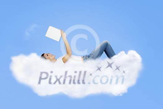 Woman on the cloud, reading a book