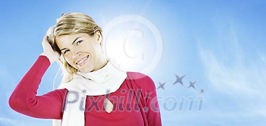 Smiling girl on a sky background Smiling girl on a sky background