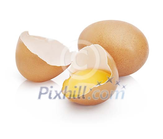Isolated broken and a whole eggs Isolated broken and a whole eggs