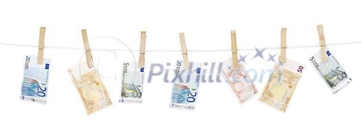 Isolated banknotes hanging on the washing line