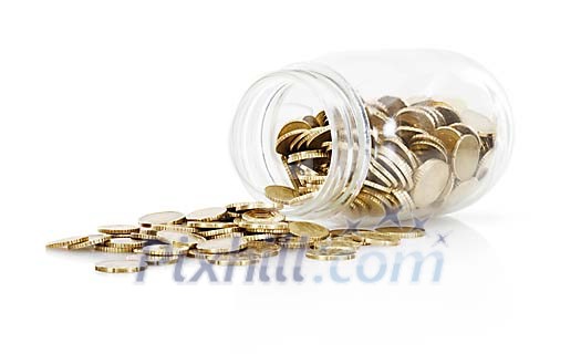 Isolated glass jar with coins spilt out