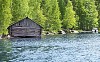 Old wooden house by the lake