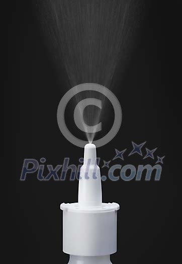 Medicine spray on a dark background Medicine spray on a dark background