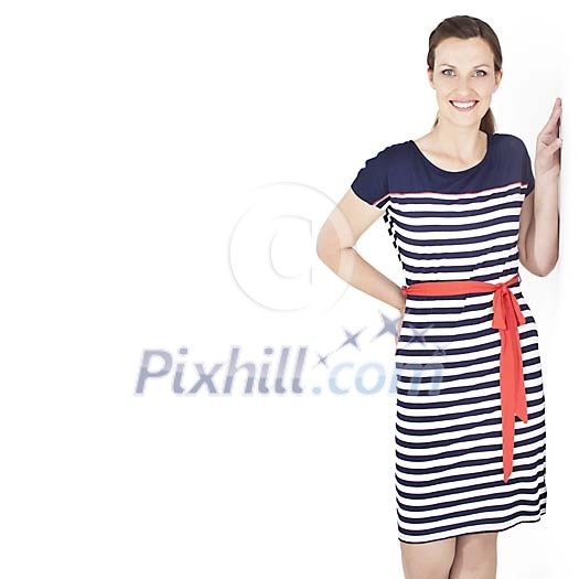 Isolated woman standing next to the wall Isolated woman standing next to the wall