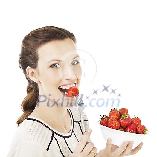 Isolated woman biting a strawberry