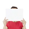 Isolated woman hiding behind a blank card
