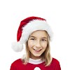 Isolated girl dressed as a Christmas elf