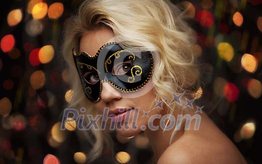 Woman with a masquerade mask