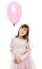 Isolated girl with a pink balloon