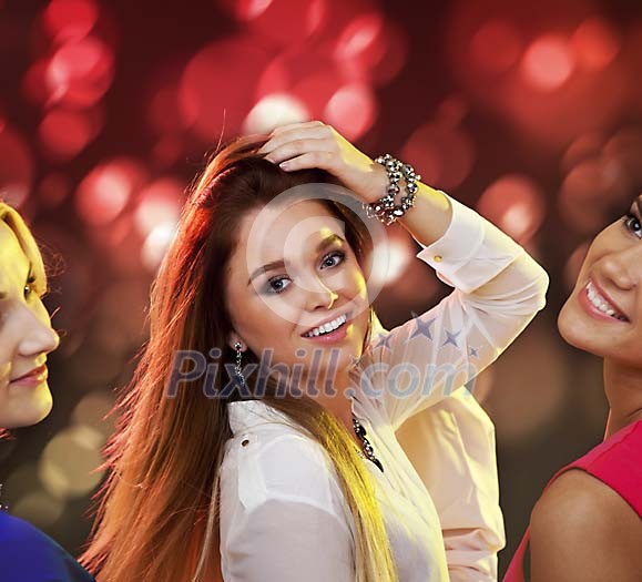 Women dancing in the club Women dancing in the club