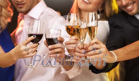 Male and female hands with drinks