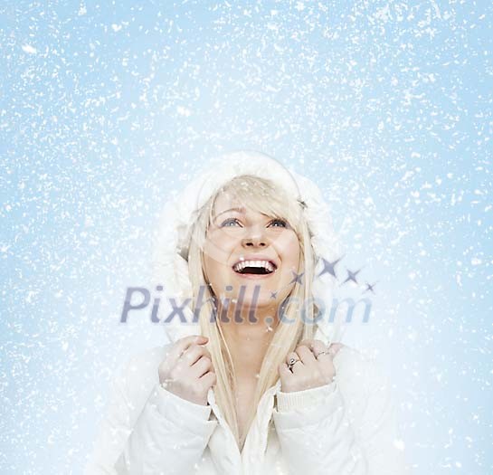 Angelic woman in the fall of snow