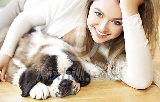 Woman with a cute sleeping puppy