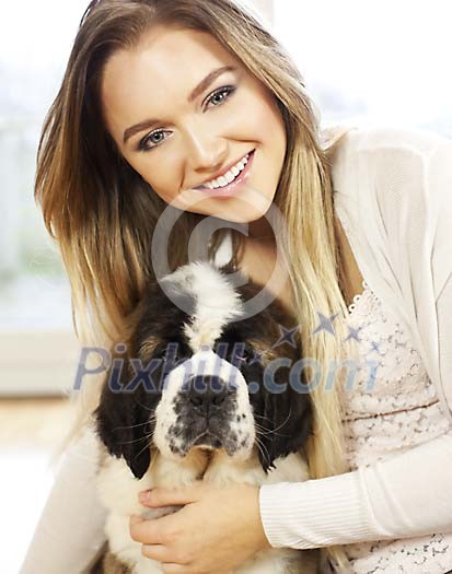 Woman holding a puppy