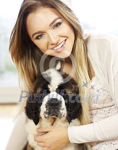 Woman holding a puppy Woman holding a puppy