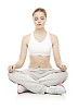 Isolated female meditating on the floor