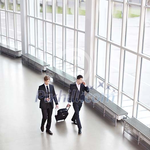 Businessmen going to a trip Businessmen going to a trip