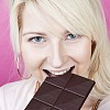 Woman eating chocolate