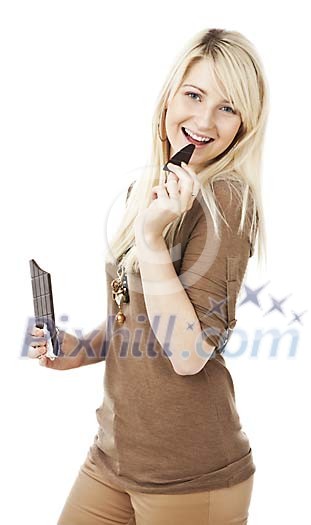 Woman having a piece of chocolate Woman having a piece of chocolate