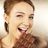 Woman ready to take a bite from chocolate