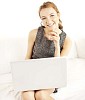 Smiling woman sitting with laptop
